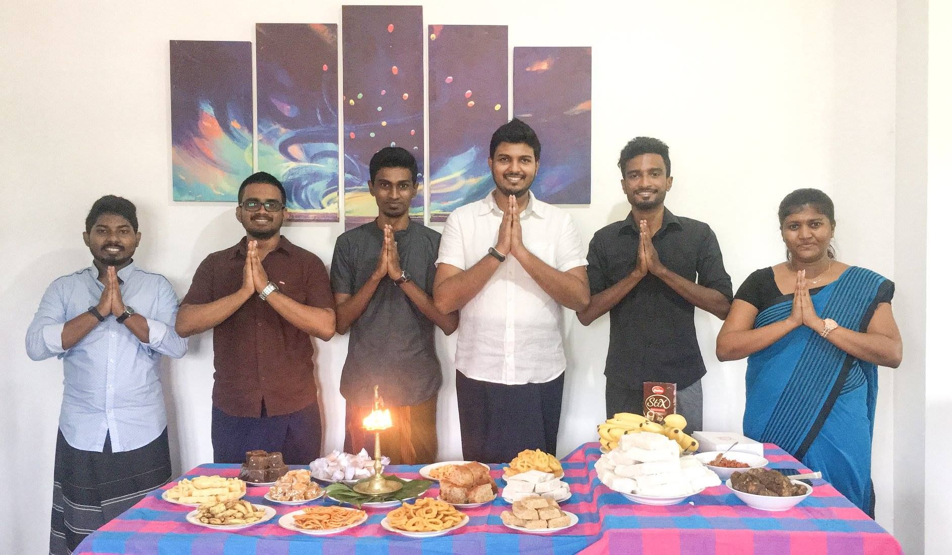 Konekt team gathered around the traditional Avurudu table in 2018